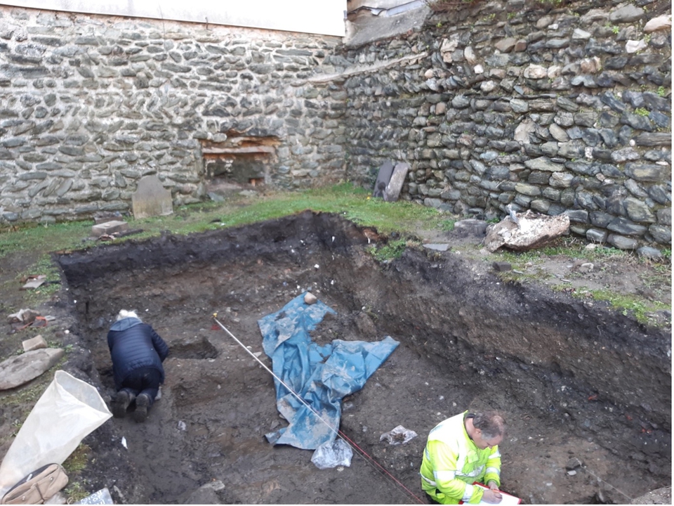 The excavation works behind Eglwys y Bedd in Holyhead