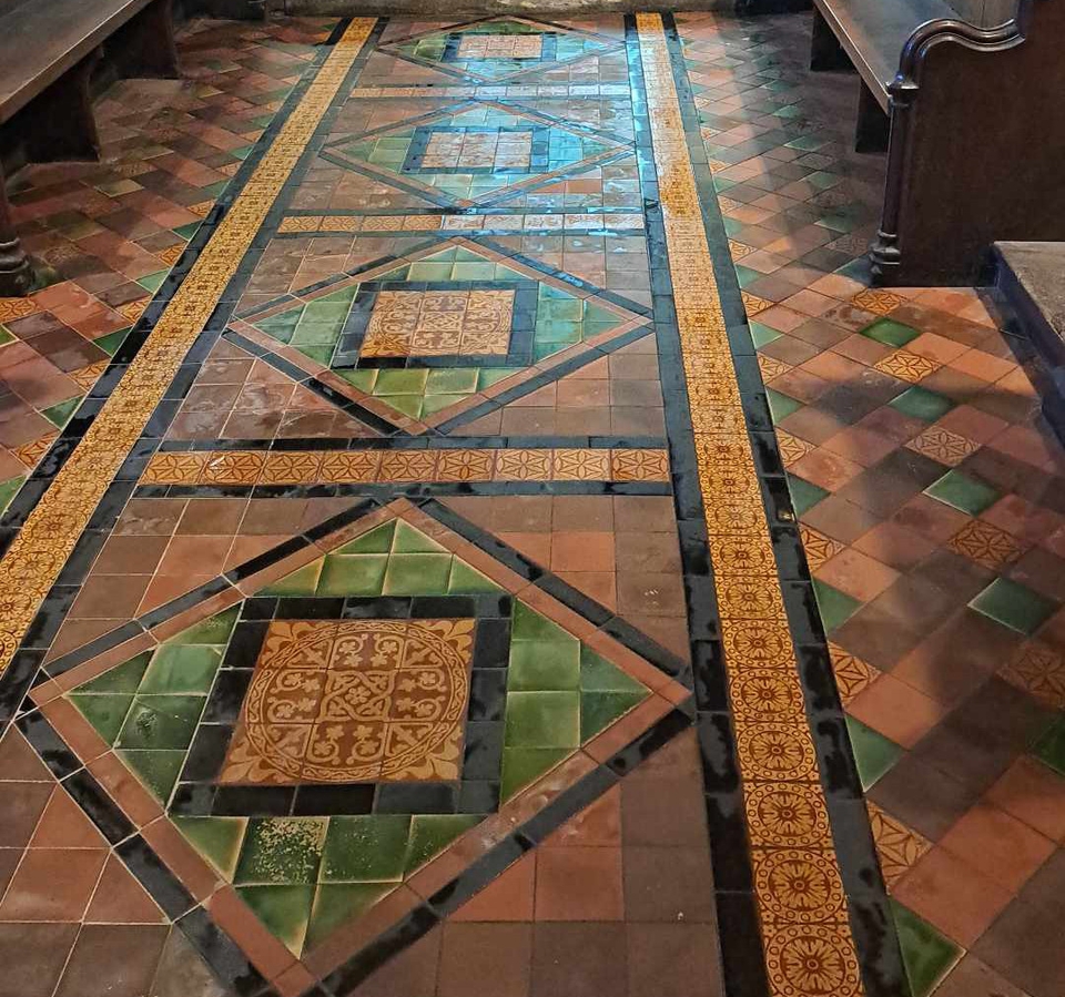 Clean chancel tiles in St Cybi's Church