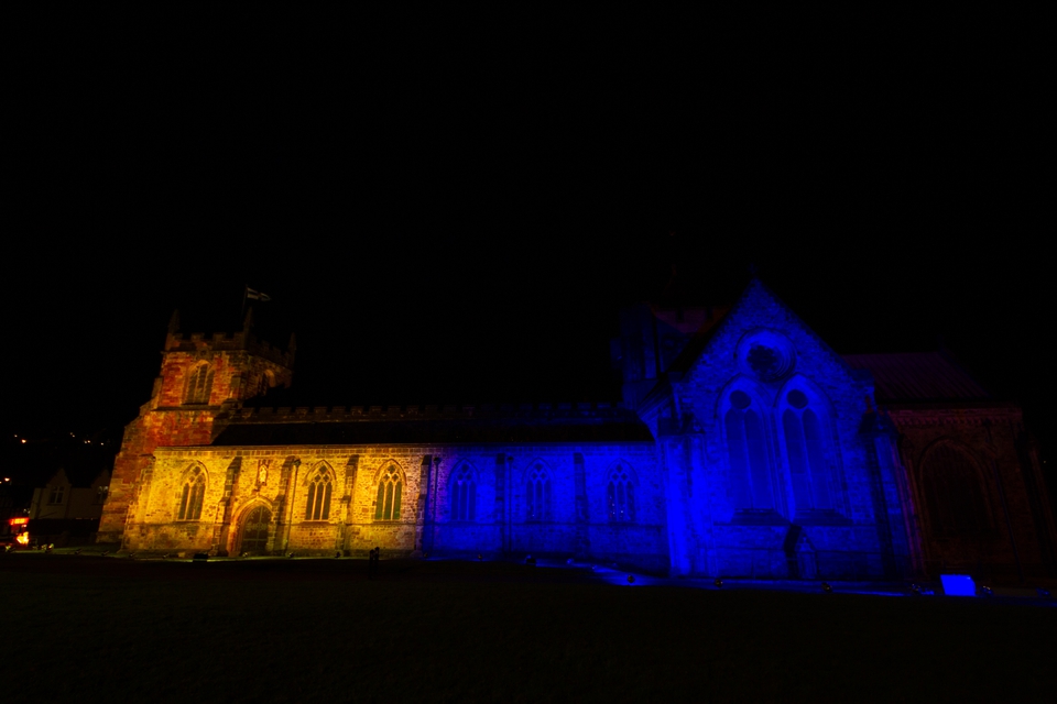 The Cathedral lit in blue and yellow